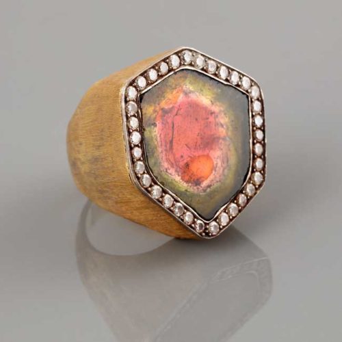 A gold, diamond and watermelon tourmaline ring by Andrew Grima