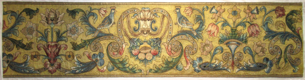 An Italian embroidered hanging, circa 1700, worked in couched and appliquéd silk. 2'4½