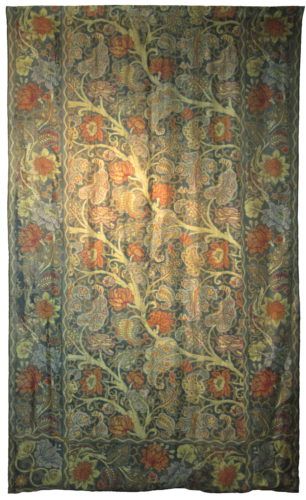‘Haddon’. An English printed silk cover, circa 1895-1910. This is a pattern known from G.P. & J. Baker’s record sample P.212, hand-block printed on a linen/jute mixture fabric circa 1902-1905; the pattern, however, dates from earlier, the border blocks having been cut in July 1895. A small piece of paper proof identifying the main pattern as coming from block B67 and the borders from B95 name the design as “Haddon”. The designer’s name is not recorded, although Sidney Mawson has been suggested. It was produced for Baker's client No.10, which may have been Liberty. 9’6½” (291cm) x 5’8½” (174cm).